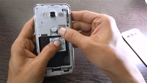 How to insert MicroSD card into Samsung Galaxy J5 .